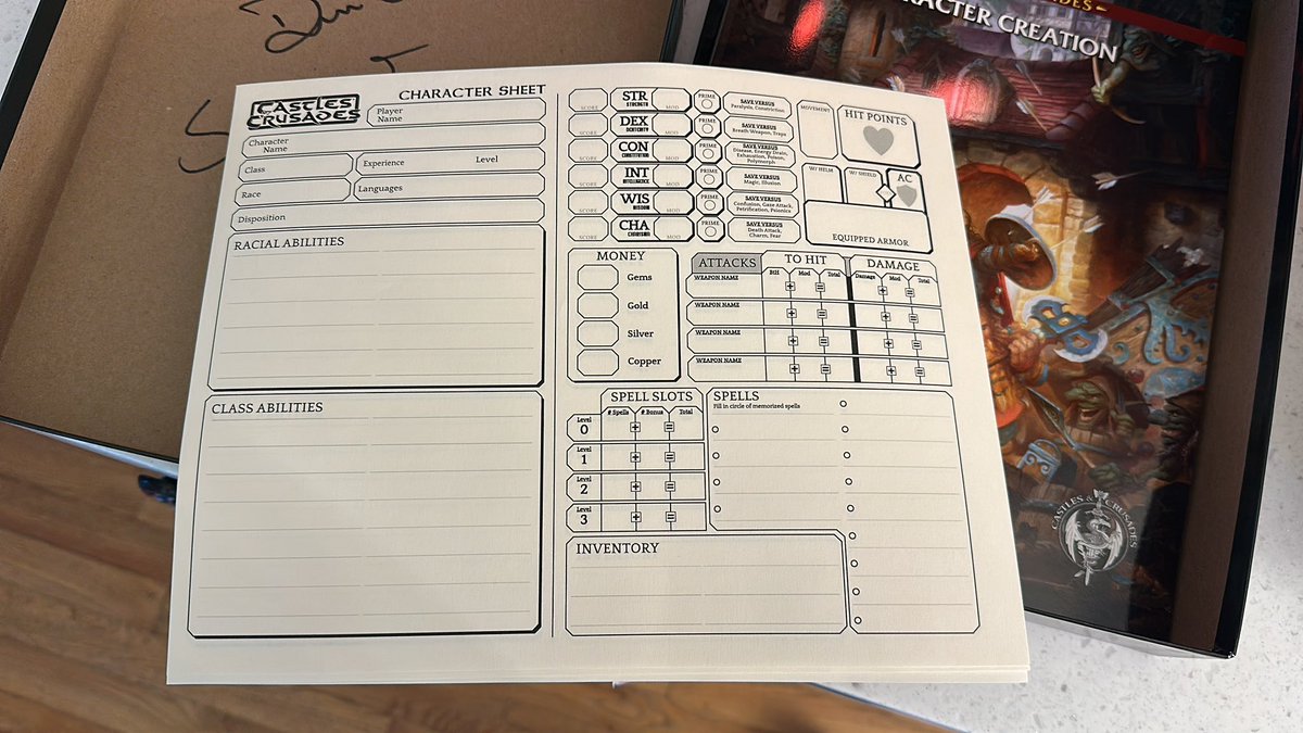 Let’s go Castles and Crusades Starter Set! Whatcha think about the character sheet design?!