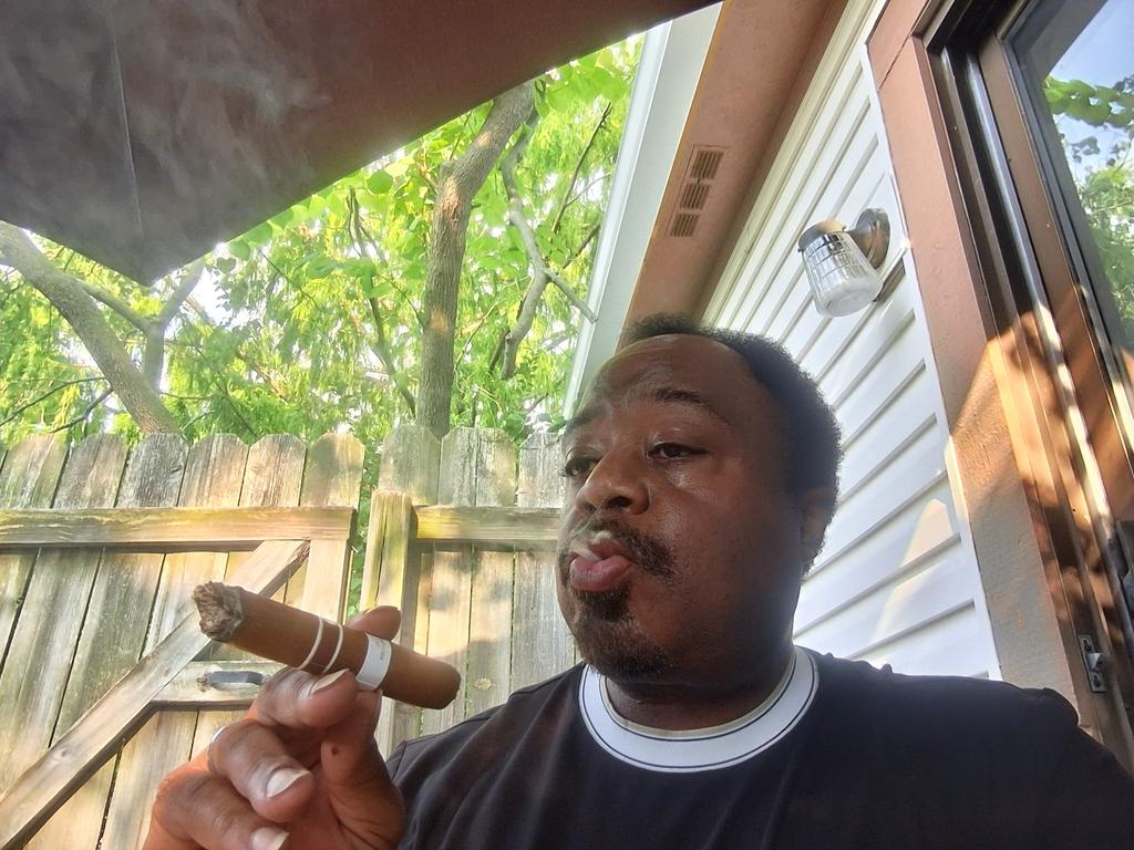 Blowing smoke while writing a speech for tomorrow night.