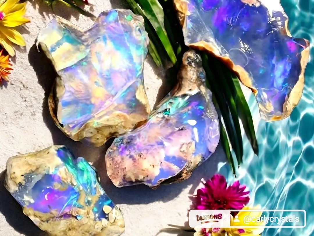 I am thrilled to offer a stunning collection of Ethiopian water opals, renowned for their vibrant play-of-color and unique beauty. From fiery reds to serene blues 💎 What’s *your* favorite opal color? 

Share in the comments below! 💬

 My favorite is the mesmerizing pink with