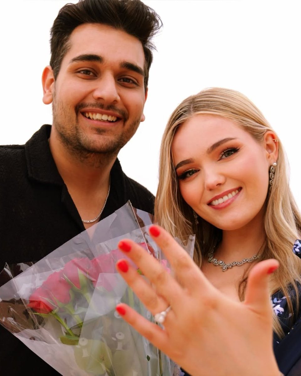 Thia's spectacular oval diamond is set in a platinum band, adorned with smaller pavè diamonds and marquise side stones. 

Karen &amp; Aditya's romantic moment was picture-perfect, and we wish them lots, and lots of love, with many more beautiful flowers 🌹💍

 #engagementring
