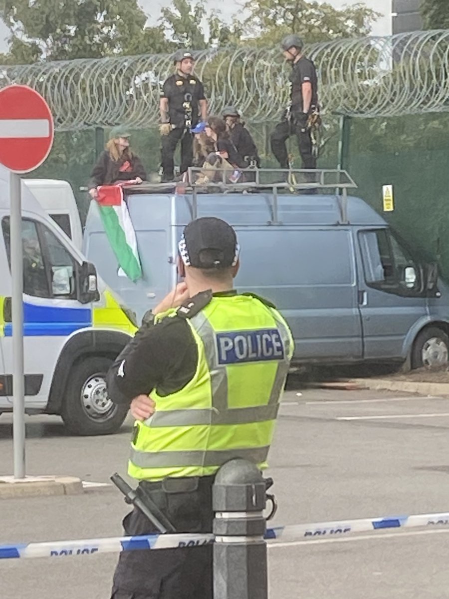BREAKING: Scottish group launches by taking action against Leonardo's Edinburgh factory.

The front of the site has been damaged and action takers drove a van into the perimeter.

This factory makes laser target systems for Israel's F-35 fighter jets.