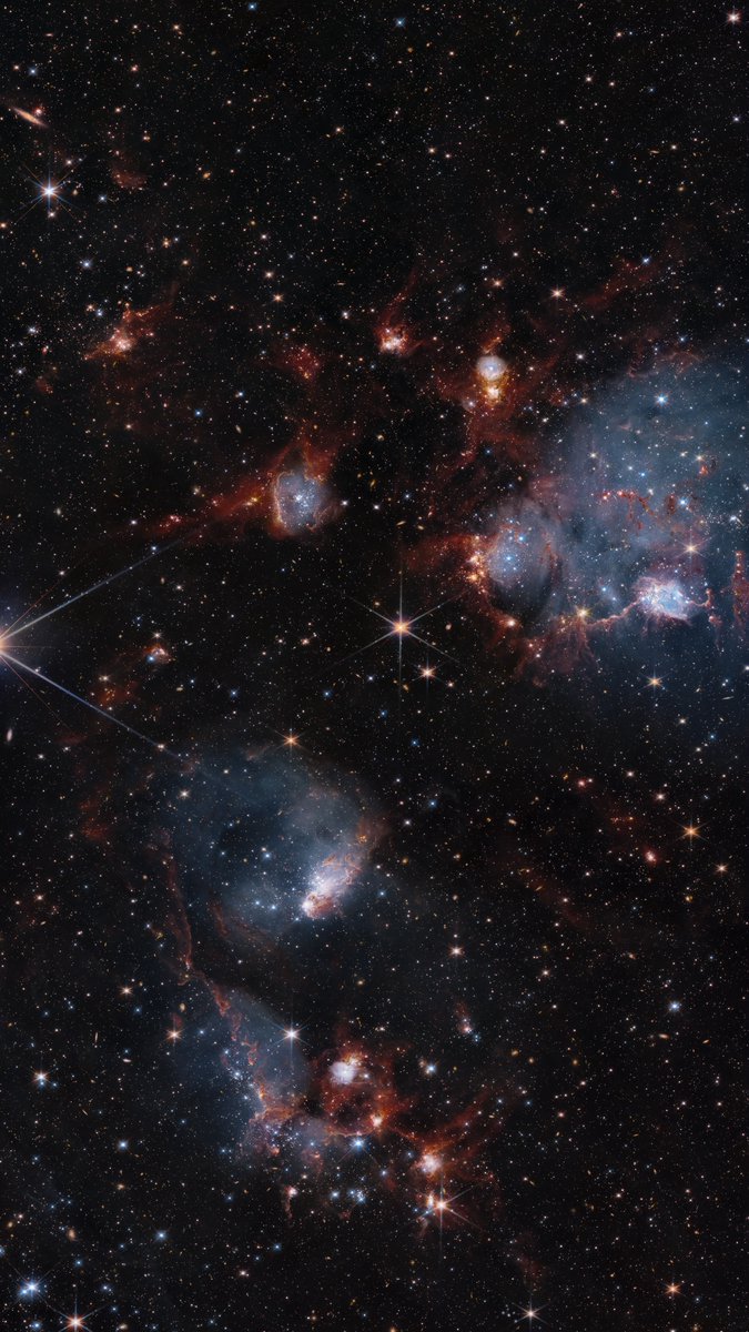 NASA360's tweet image. .@NASAHubble sees glowing gas. @NASAWebb sees warm dust. Together? A vast cosmic web strung between two star clusters in a nearby galaxy.
This epic image showcases the power of teamwork across light-years and telescopes. go.nasa.gov/44Bx1ZM