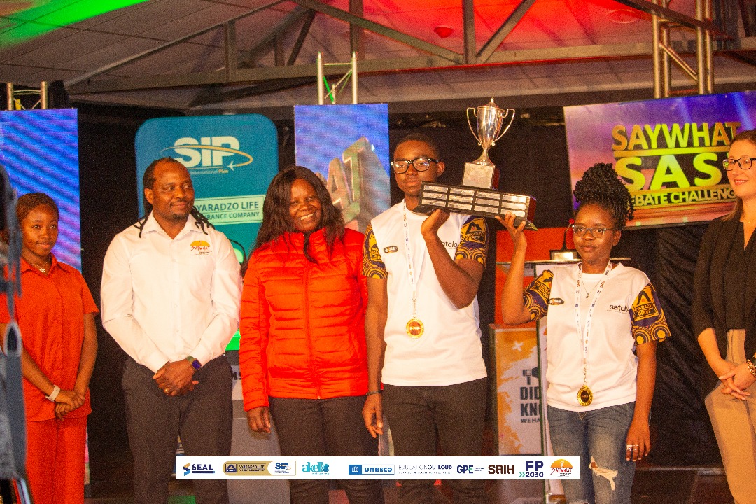 SAYWHATOrg's tweet photo. They came. They spoke. They conquered.
Massive congratulations to @Manicaland State University of Applied Sciences for clinching the title at the SASI Debate competitions
Your eloquence, passion, and preparation were unmatched.
#SASIdebate
@Nyaradzo_Group
@SAYWHATOrg https://t.co/654y1ssdCF