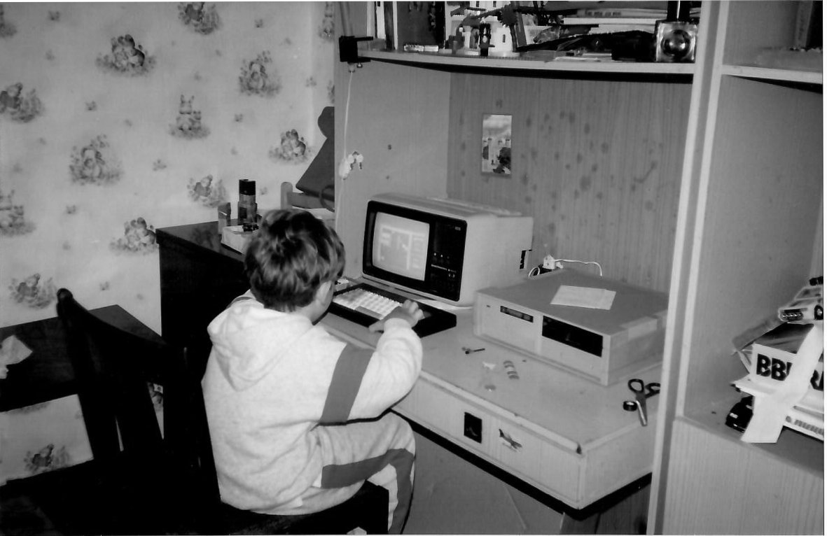 n_pzdn's tweet photo. That's me sitting in front of Pentagon 128 (A Soviet copy of British ZX Spectrum) back in around 1993. There was no UI, you had to use console commands for the operations, even starting a game. https://t.co/Tq3cmVnhCg