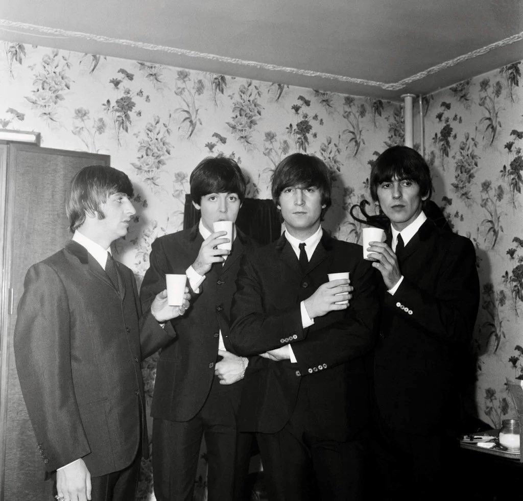 BooksBeatles's tweet image. The Beatles take on refreshment backstage at the De Montfort Hall, Leicester, 10th October 1964. The hair here is particularly excellent.