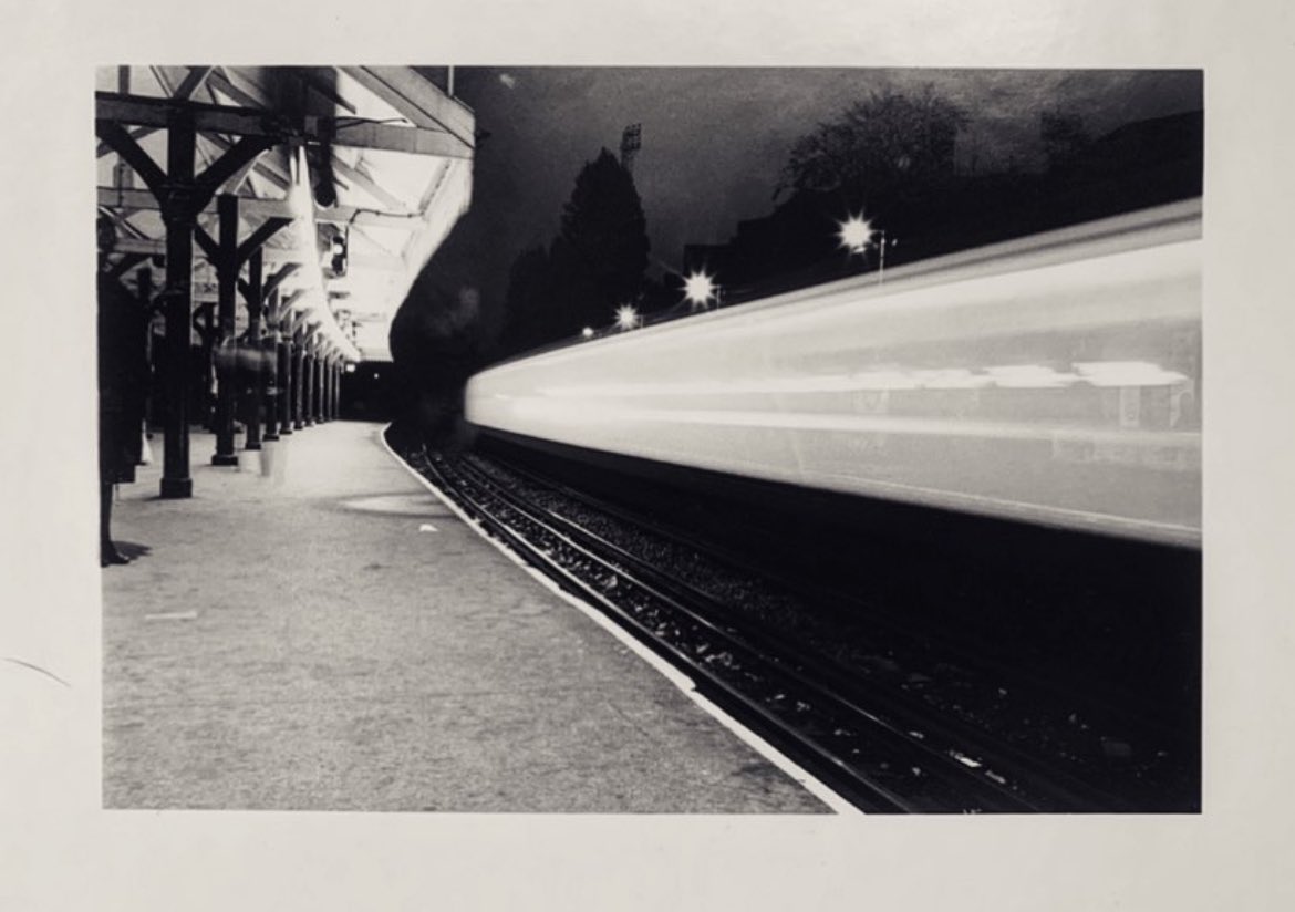 DavisArchive's tweet image. Day 2 portfolio’something unseen early college project stuff hitchhiked to London with camera and tripod image: light and movement Fulham Broadway tube station 1989 you can see the floodlights at Stamford Bridge in the background