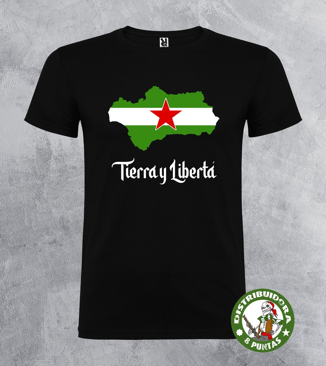 Camiseta andalucista reivindicativa con el mapa de Andalucía y la arbonaida con la estrella roja obrera y revolucionaria en su interior y la leyenda revolucionaria «Tierra y Libertad» aparecida en nuestro Himno Nacional. Hay otra versión anterior más antigua con el gadeiro en web