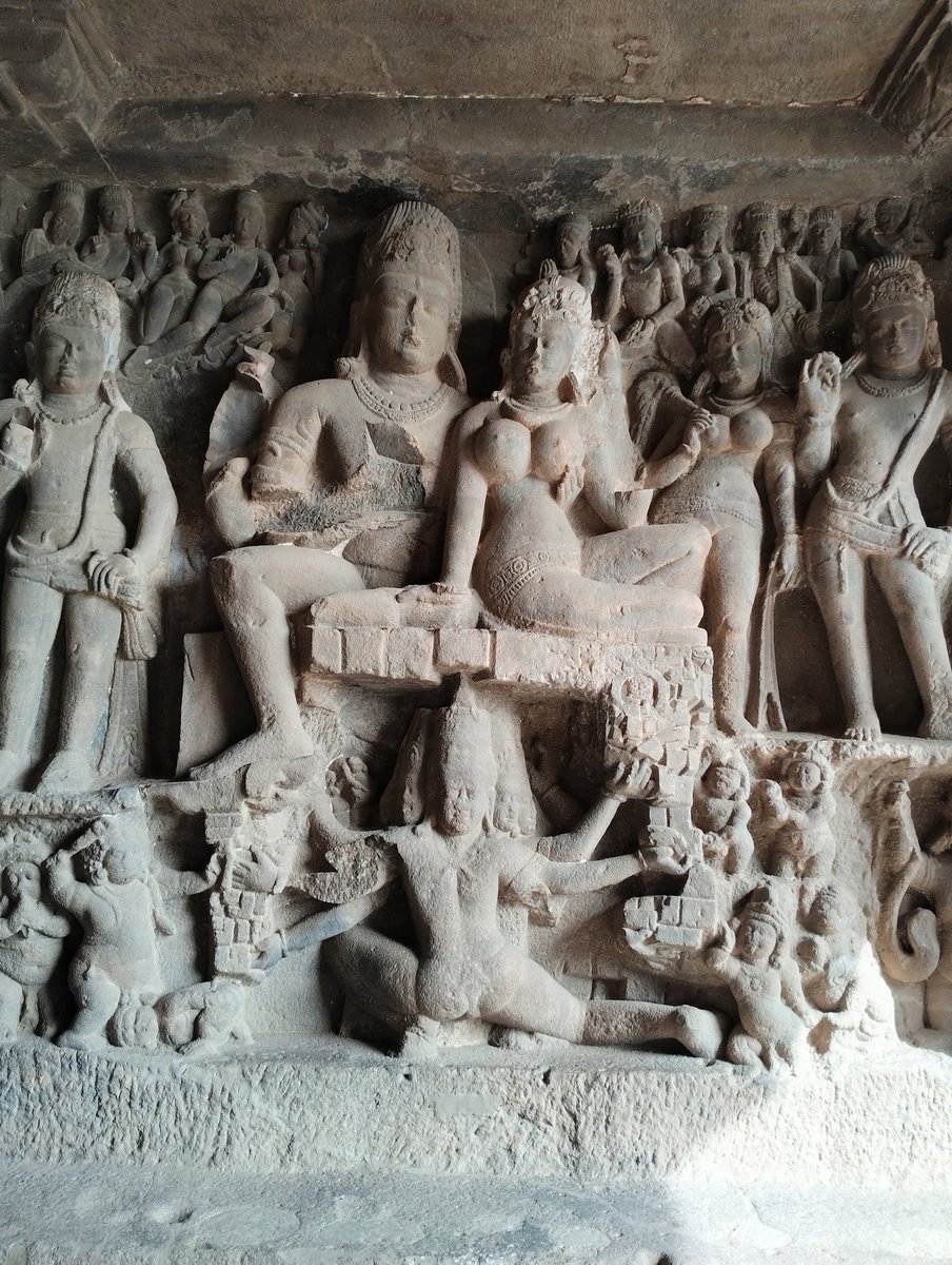 Shiva Parvati is sitting on human head is human or else.
Please answer.