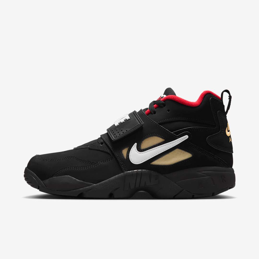 black nike shoes with gold check