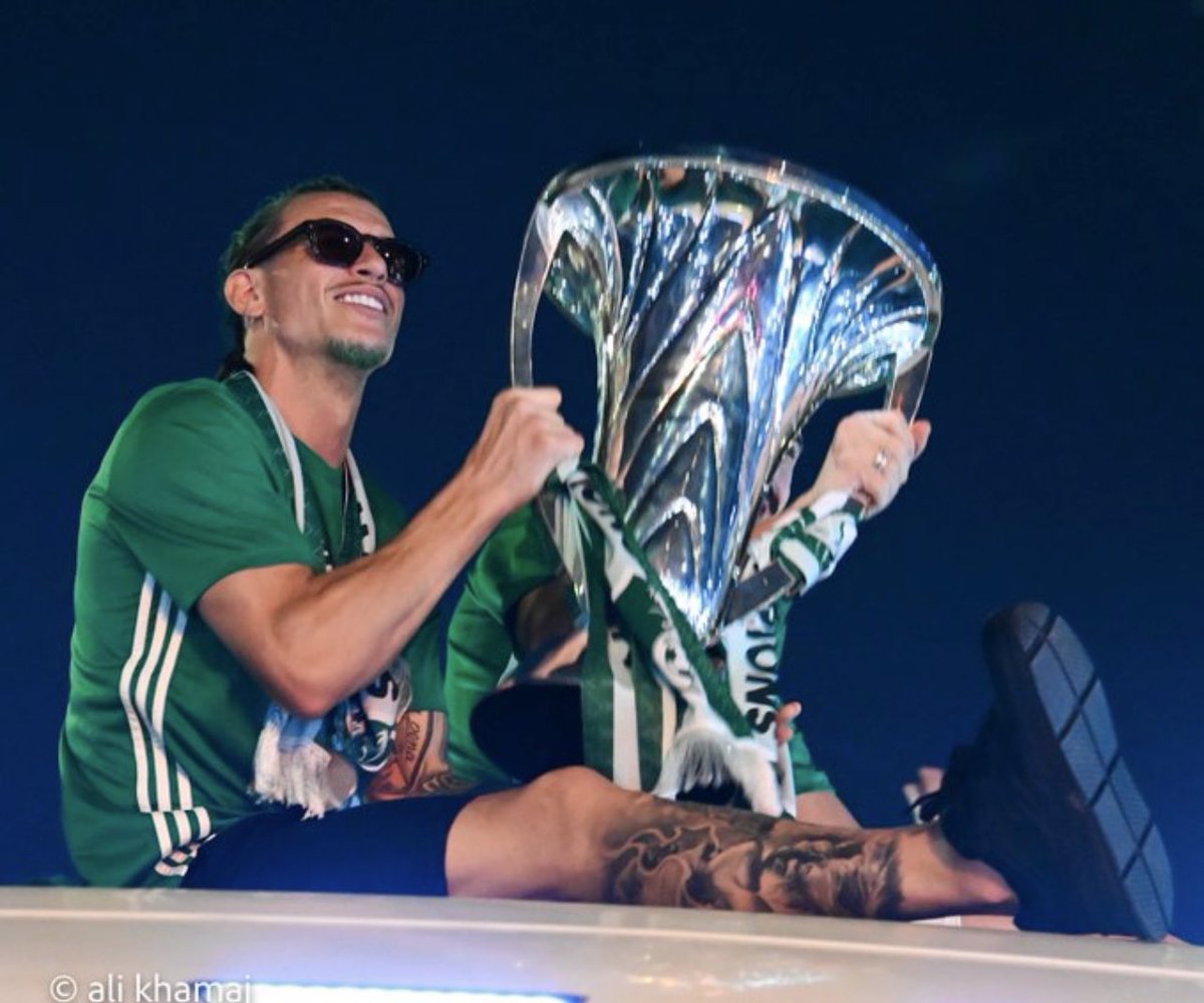 dudedoit5's tweet photo. My champ raised the Elite Cup in victory! and I got to raise it in pride🏆💚 https://t.co/9eL1rqYrr6