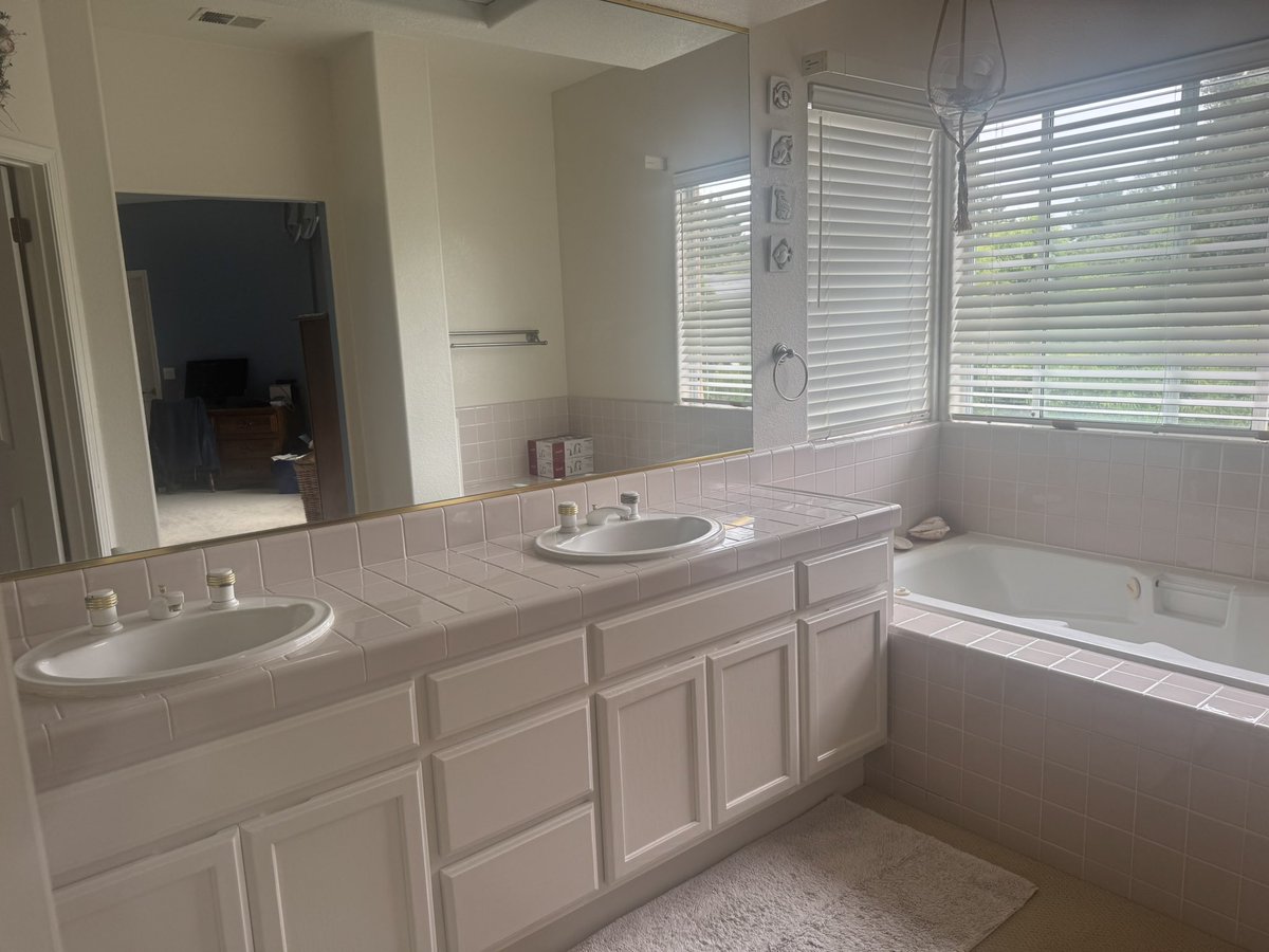 Bathroom project completed - before Benjamin Moore Seafoam Green and after Benjamin Moore Maritime White. Next project installing faucets. #summerproject #beforeandafter #BenjaminMoore #painting #bathroom