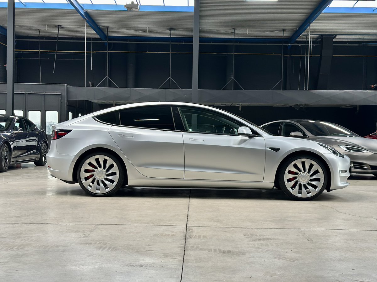 Full wrap Satin White Aluminium and body color Überturbine wheels. Tinted windows and and alcantara interior trims. ❤️ Tesla model 3 Performance 2021.