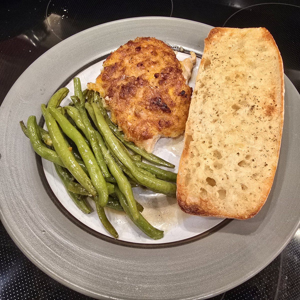 fredcompton's tweet photo. Baked cheese and garlic chicken breast with green beans and parmigiano reggiano  truffle butter baguette. https://t.co/oRglNkWHEj