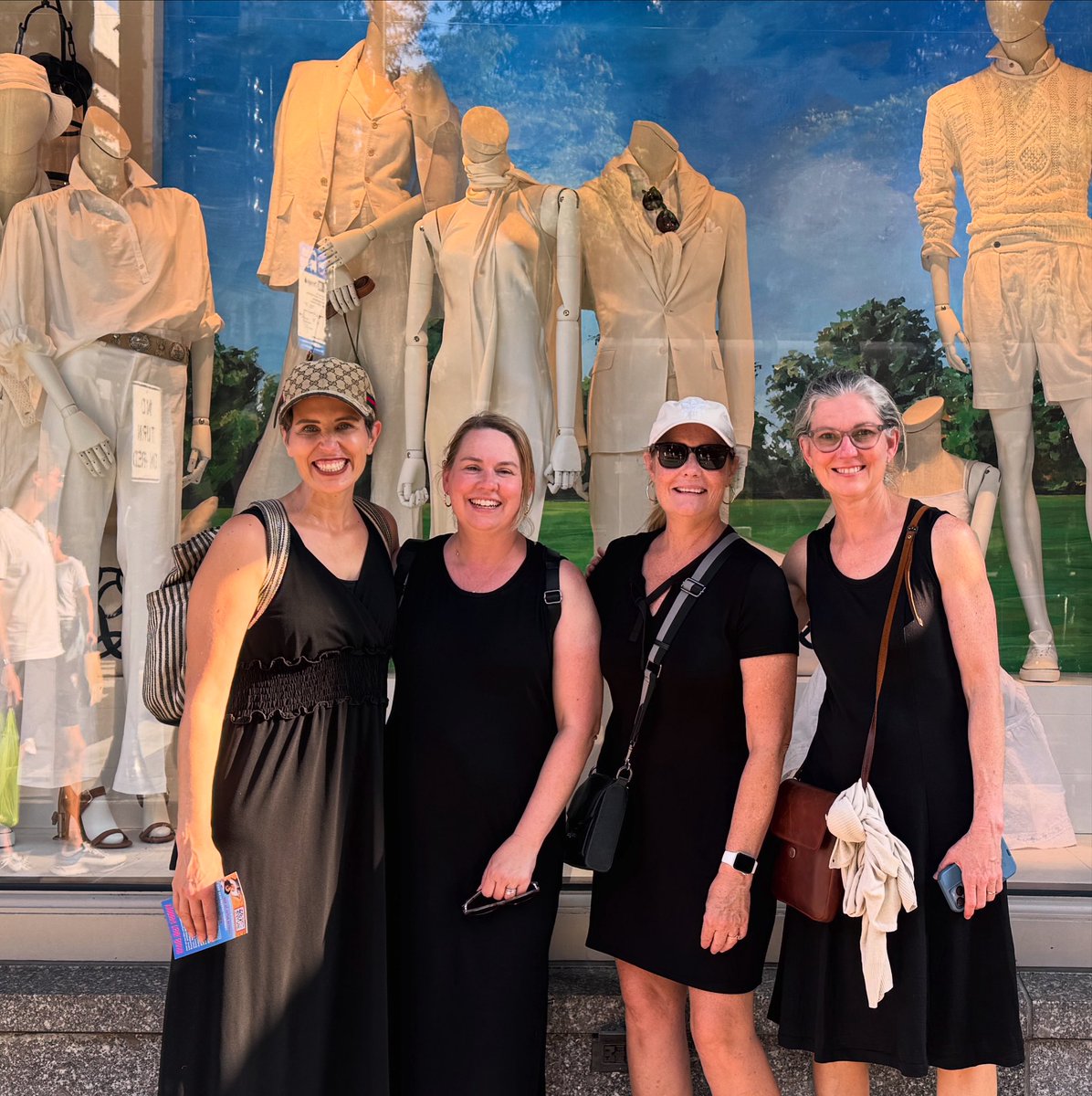 NancyAFrench's tweet image. My friends and I all showed up wearing black… so we paused in front of this store front where the mannequins were dressed in white.