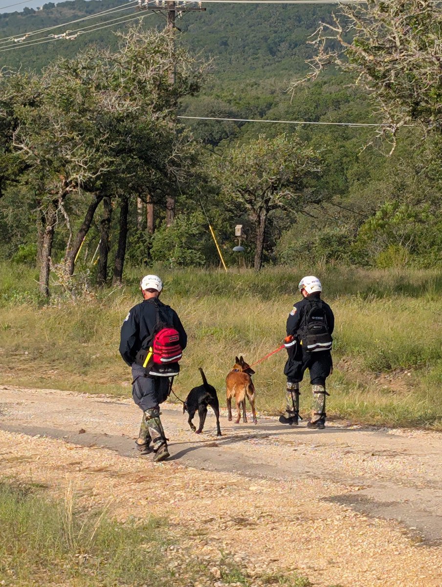 MnDPS_DPS's tweet image. Minnesota Task Force 1 is continuing its important work in Texas. Today they were reassigned to the Kerr County area. The terrain and heat, along with the threat of snakes and fire ants, have been hard on the dogs. But everyone is resting and hydrating and staying safe.