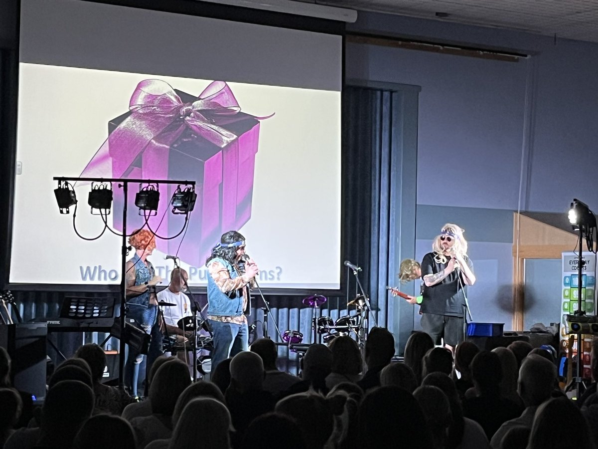 Wow! The Purple Pens staff band have taken to the stage. It’s like having Guns &amp; Roses in the room with us! Amazing… and needed to be seen to be believed! #WeAreCrofton