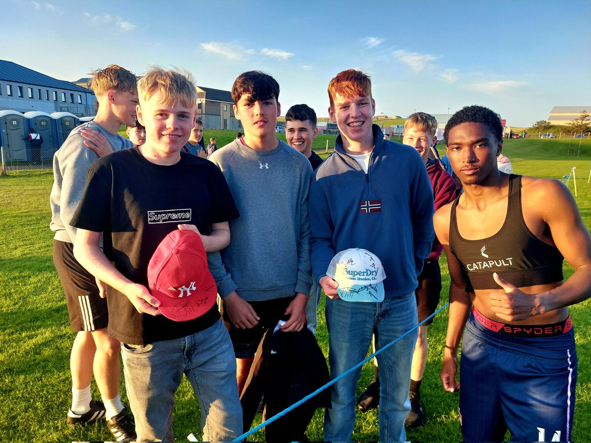 BernewsSports's tweet photo. Bermuda men's under-23 footballer Jace Donawa signs baseball caps for local supporters after a 2-2 draw against Ynys Mon at the Island Games in Orkney https://t.co/MXyvGaTt5Q