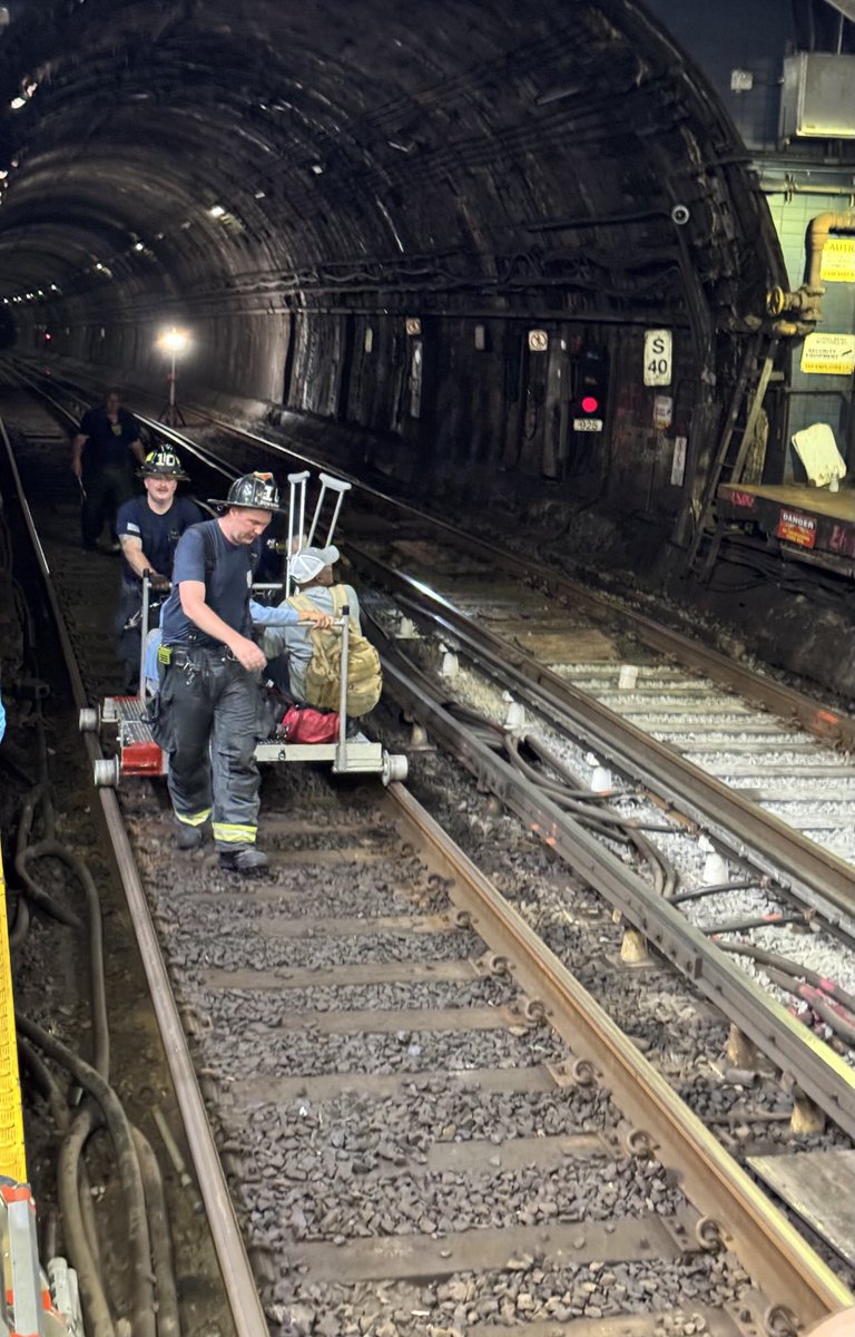 BostonFire's tweet image. It took firefighters approx. 1 hr to evacuate 500 people from a @MBTA Blue Line train that was disabled under the harbor between Maverick & Aquarium station. They used the Nolan cart to transport anyone needing assistance using 3 exits , 2 in Boston & 1 in East Boston