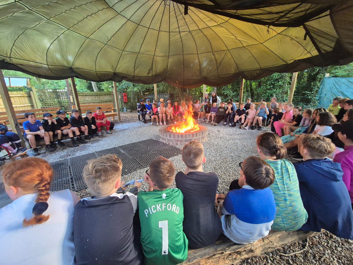 KirkbyTrips's tweet photo. What another action packed day of activities. The children all braved the weather and participated with enthusiasm. After tea, we sat around the camp fire and sang, played games and celebrated a child’s birthday in style with brownies. ❤️ https://t.co/lNWyyKk4Rw