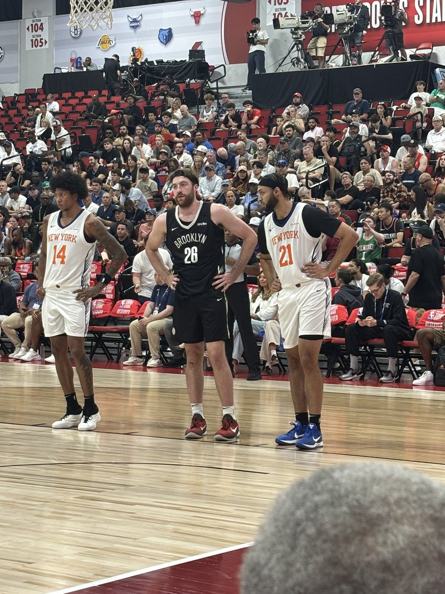 Timme and Watson chatting briefly at the free throw line before Nets subbed Timme out.