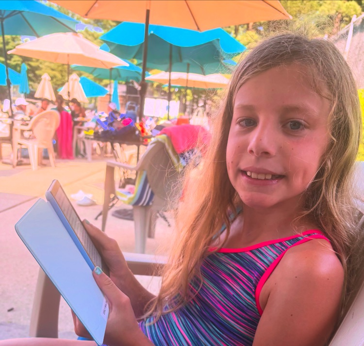 Emily is reading at the St. Andrews Swim &amp; Tennis Club! Where are you reading this summer? #ParkPRIDE #BelongGrowSucceed #SummerReading