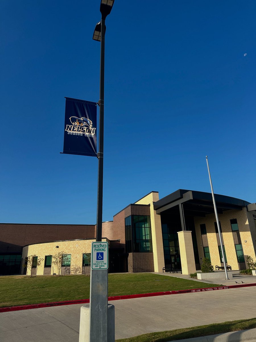 We got some more new additions to Nelson over the summer with spirit flags on the lighting in the parking lot! #HawkNation #schoolspirit #NJH #NJHawks #flyfierce