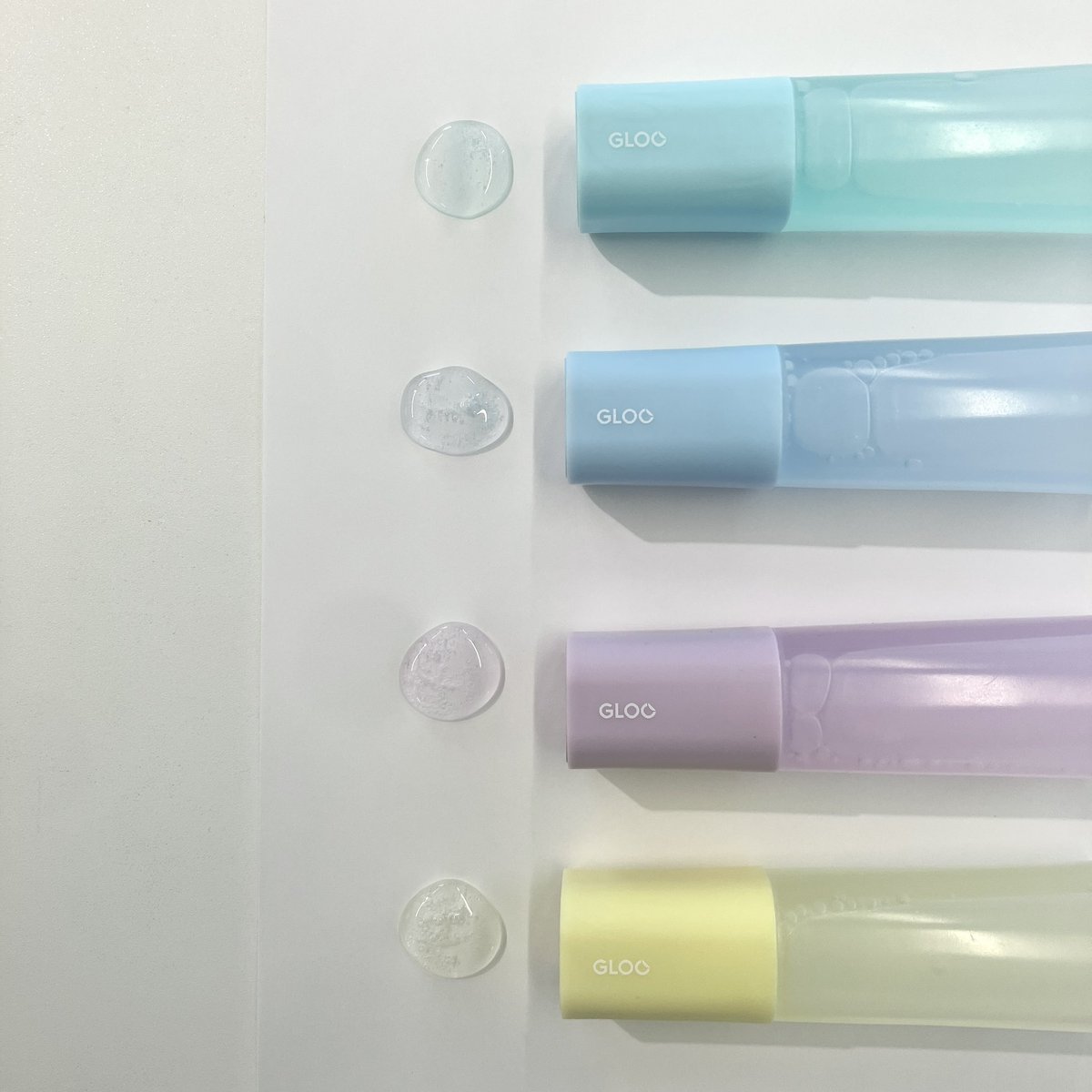 kokuyo_st's tweet image. 【リリース】#GLOO スティックのり・液体のりより夏の自由研究やおうち工作を爽やかに彩る限定ソルベカラーを発売！（7/23~）

夏っぽいカラー×クリアボディが可愛すぎます🙈💚🩵💜💛
なんと塗った面もほんのりソルベカラーに！（画像は液体のり）

詳細↓
kokuyo.co.jp/newsroom/news/…