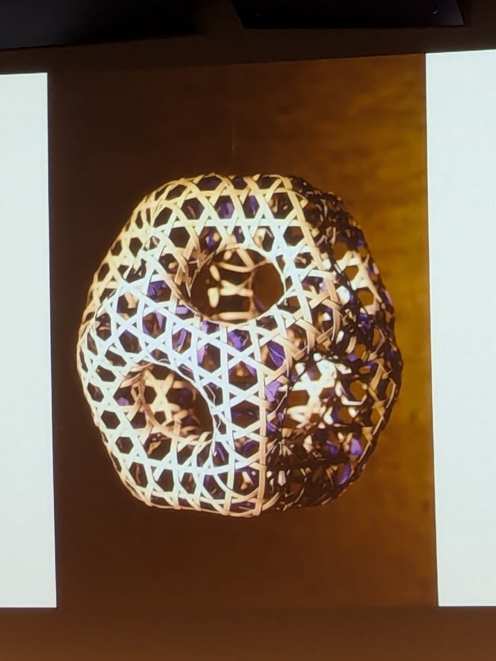 msmathcomp's tweet image. First keynote this morning at the @BridgesMathart conference is given by Alison Martin, telling us about &quot;Transforming 2D Materials into 3D Objects: Flexing and Stretching the Rules.&quot; Using bamboo as the material, Alison creates intricate weavings.
📜 archive.bridgesmathart.org/2025/bridges20…
