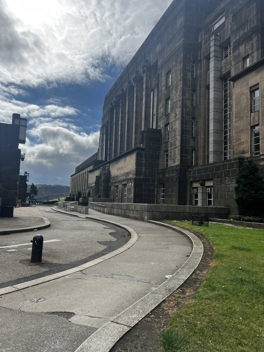 Enjoying the new office and its imposing nature.