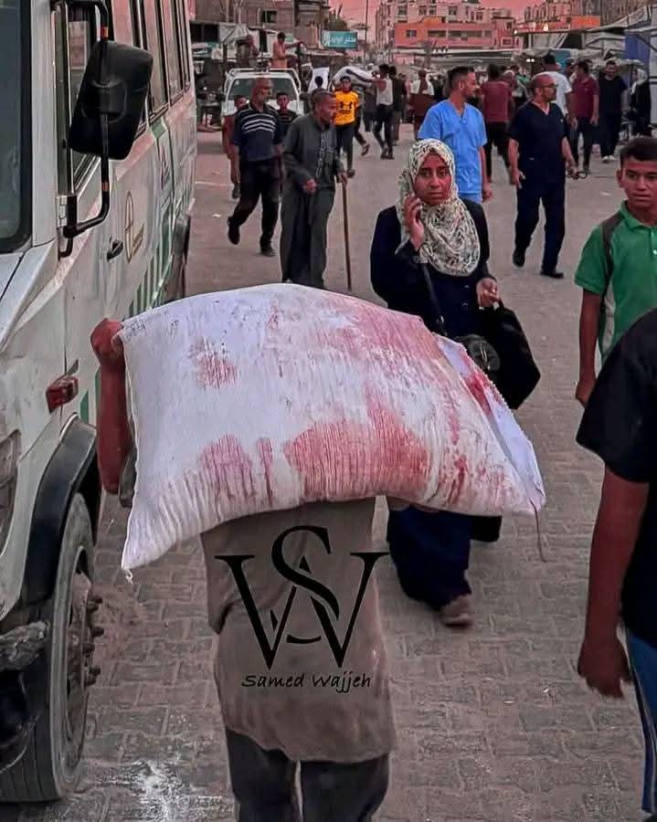 الطحين المغمّس بالدم.. 
#هنا_غزة