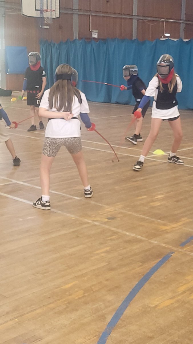Group 17 enjoying their last activity of their residential - fencing.