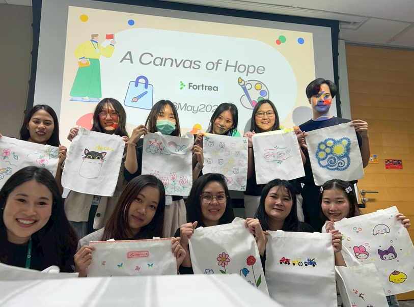 🎨💙 At Fortrea, giving back is part of who we are. This year’s “Canvas for Hope” brought our Thailand team together to hand-paint bags, fill them with essentials, and deliver them—along with smiles—to children at the Thai Red Cross Orphanage Foundation. #FortreaForBetter
