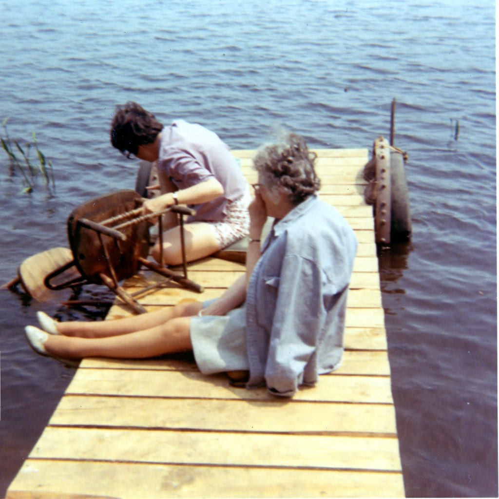 tomschloegel's tweet image. Like great-grandmother and grandmother like granddaughter. Intergenerational installment of you can just do things.
Photo on right is Betty and Chickie dipping the chair they’re recaning in the lake to dampen the cane.
Also: Chickie is a such a classic nickname.