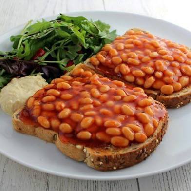 This is how the British eat their baked beans. On toast. Today we celebrate our independence from that, if nothing else.
