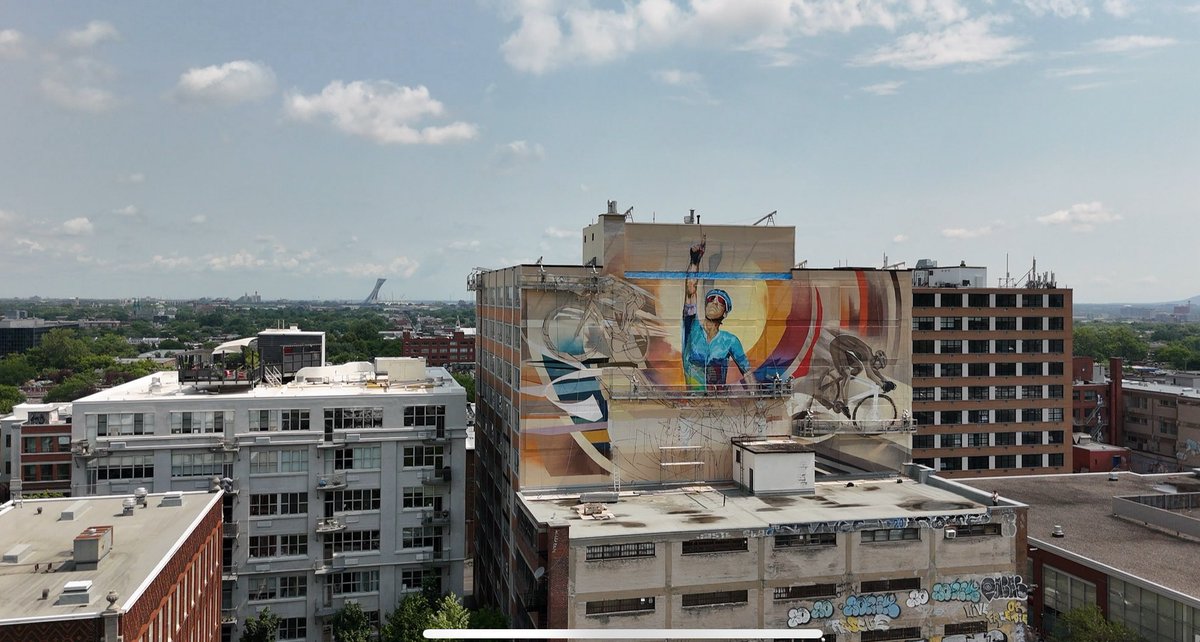 🎨🚴‍♂️ A mural in progress on the streets of Montréal — a beautiful tribute to Hugo Houle taking shape under the summer sun.