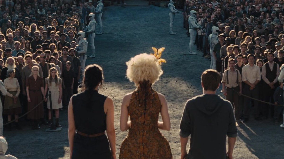 “every july 4th, each of the districts routinely has to send two tributes [...] to fight to the death in an arena“