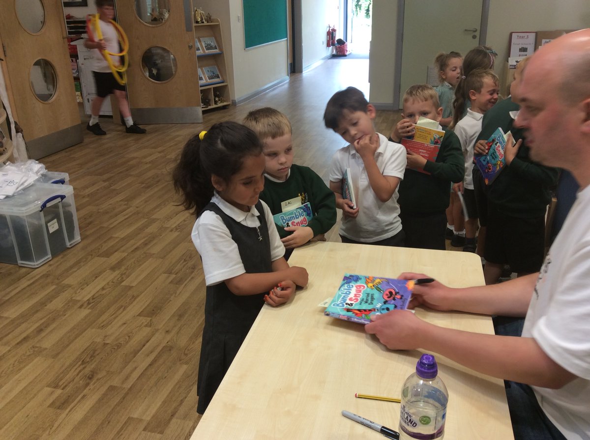 Mark very kindly signed all the books for the children...we had to relocate him from the hall ready for lunchtime!