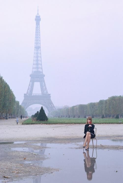 Françoise Hardy in front of the Eiffel Tower, 1960s.