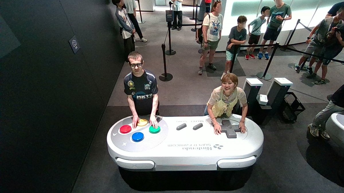 Agentdave7's tweet image. I went to @N_Officialstore in Kyoto and then to @Museum_Nintendo. I made a new friend that really likes Nintendo and Disney also! We tried playing Super Mario Kart using the giant SNES controller.