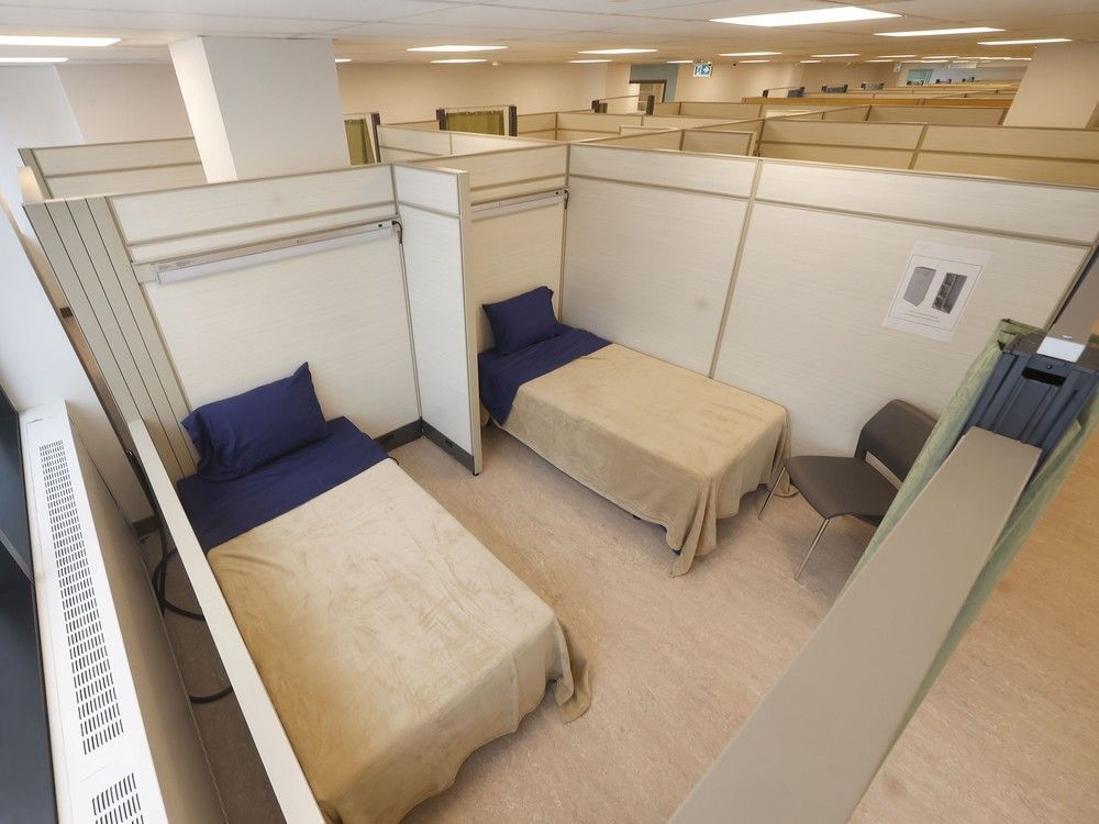 City officials unveil converted office building as 'major milestone' in transitional housing ottawacitizen.com/news/converted…