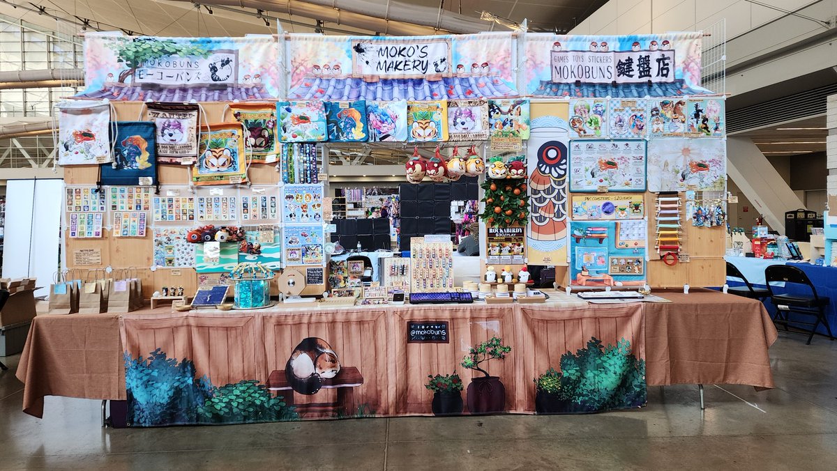 Y'all I'm currently sitting at my BIGGEST SETUP EVER. I'm super excited to show off some brand new merch, so come by and say hi!! I'm at #anthrocon2025 booth Q01~02!!
