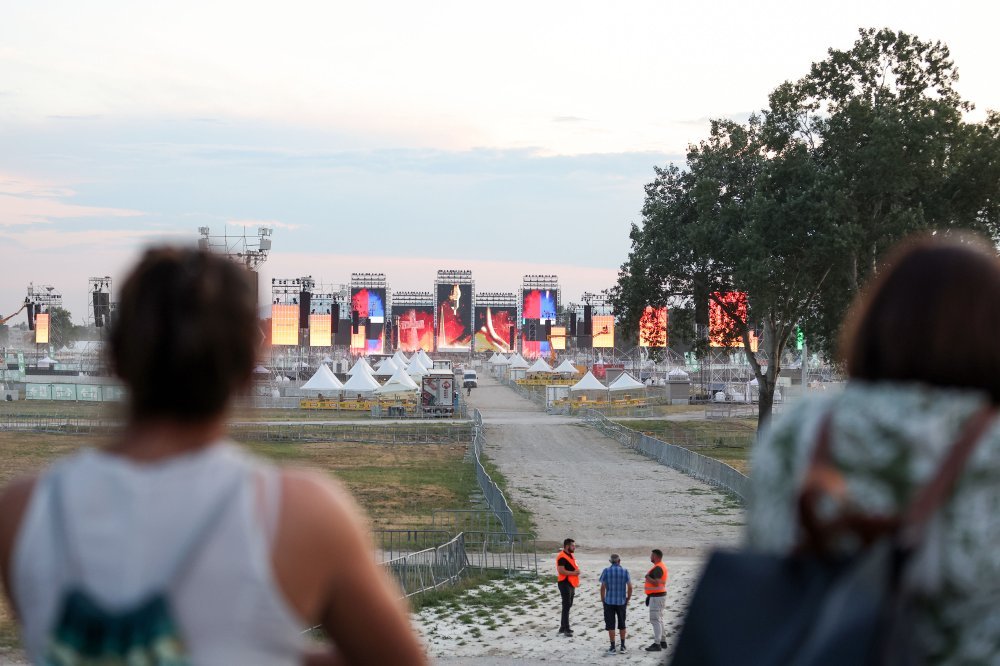 Gandeloft's tweet photo. The biggest concert in history (by tickets sold) is taking place tomorrow in Croatia, Zagreb!

The spectacle is happening because of the croatian musician Marko Perković Thompson.
He is going to sing for a crowd of over 500.000 people. 
Croatians are arriving from literally all over the world for this.

More than 700 speakers, 1000 drones...
Extensive security including anti-drone measures such as frequency jamming..

Here are some photos from yesterday's final rehearsal.

This is a nationalist singer, all Croatians like him so there are many anti-Croatians (communists, ("anti")-faschists, and other scum which should be kicked out of the nation they speak against of) who hate this and will speak many lies in their goal to make this something bad, and not good.
IT WILL BE EPIC!!!
I got tickets from a collegue and am going as well.