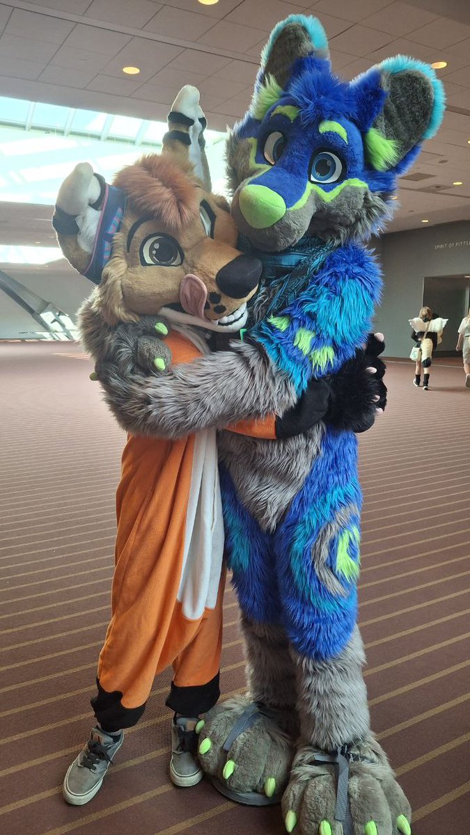 I'm a sucker for hugs from tall adorable floofs.
It was great seeing you <a href="/RiggyFolf/">Riggy Folf Was at ANE</a>
