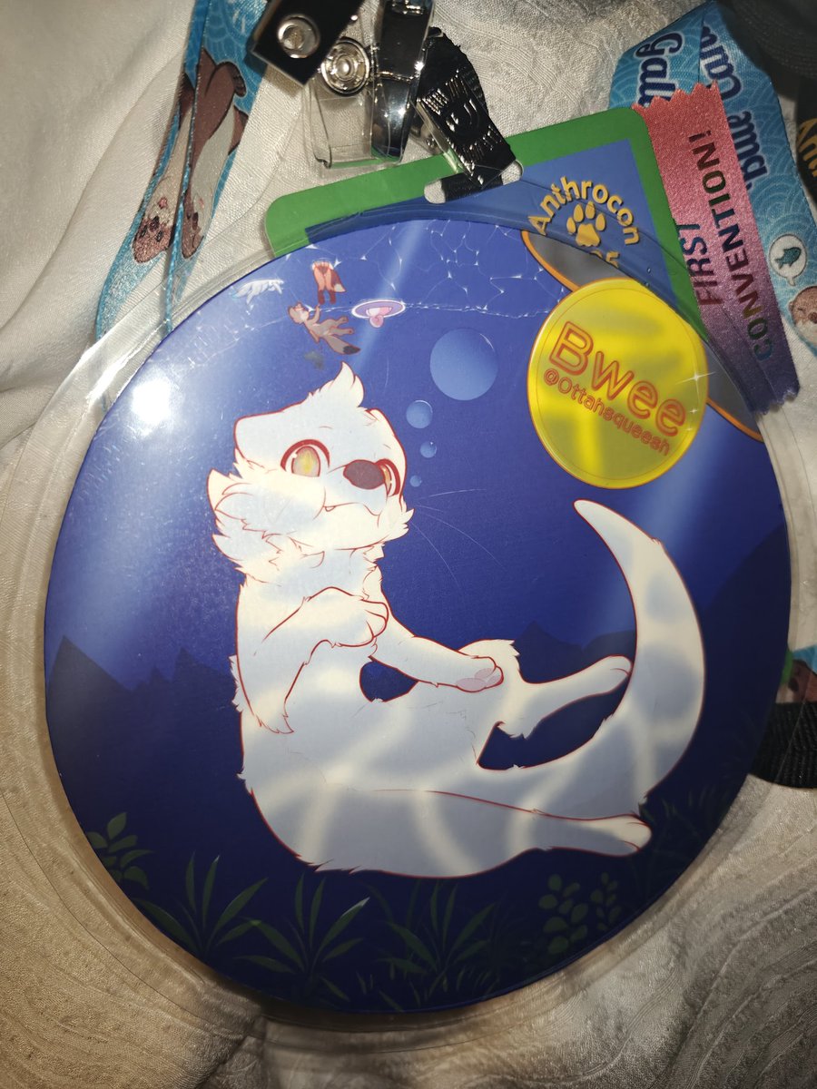 Anthrocon badge, come say hi if you see me, i still have some stickers to give out.