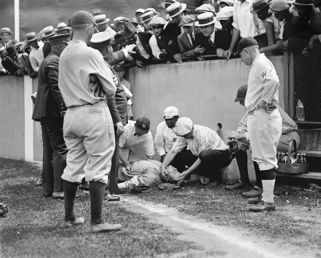 Babe Ruth unconscious at Griffith Stadium in Washington during a game against the Senators on July 5, 1924. Racing to make the catch, he slammed into a concrete wall and was knocked unconscious for 5 minutes. He would stay in the game AND play in game 2 of the doubleheader.