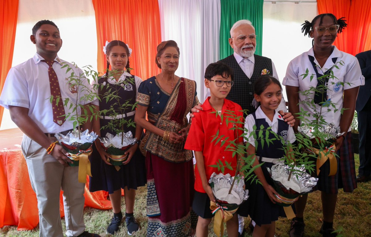 PMO India (@pmoindia) on Twitter photo PM <a href="/narendramodi/">Narendra Modi</a> and PM Kamla Persad-Bissessar of Trinidad & Tobago together planted a tree as part of the ‘Ek Ped Maa Ke Naam’ initiative. PM <a href="/narendramodi/">Narendra Modi</a> and PM Kamla Persad-Bissessar of Trinidad & Tobago together planted a tree as part of the ‘Ek Ped Maa Ke Naam’ initiative.