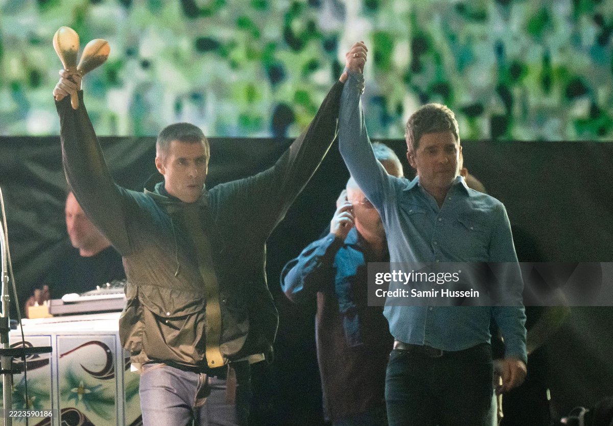 Liam Gallagher (L) and Noel Gallagher (R) of Oasis perform during the opening night of their Live 25' Tour at Principality Stadium on July 04, 2025 in Cardiff, Wales. (2025)