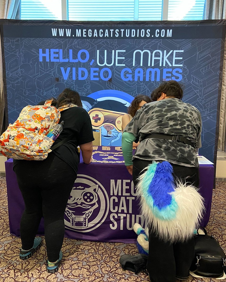 We're having a meow-velous time at #Anthrocon2025!

We’ve been playing #videogames, geeking out over amazing #cat art, and swapping stories with fellow #indieretro fans.

See you on the con floor till July 6th. 💜
