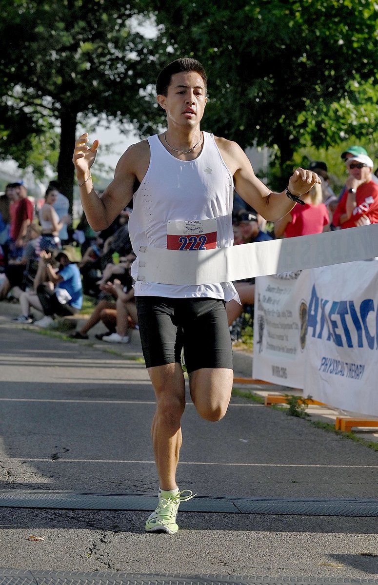 TribStarJoe's tweet image. Ethan Breen crosses the finish line to take first place in the men's open division of The Mile on Friday on Brown Avenue near Memorial Stadium. According to RunSignUp.com, Breen finished with a chip time of 4:20.79 minutes.