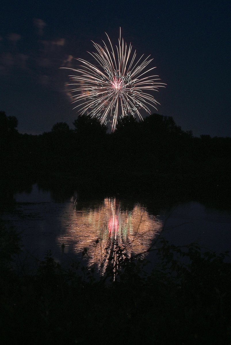 TribStarJoe's tweet image. Fireworks are reflected in the water at the Wabashiki Fish & Wildlife Area during the show Friday evening over the Wabash River near Fairbanks Park.
